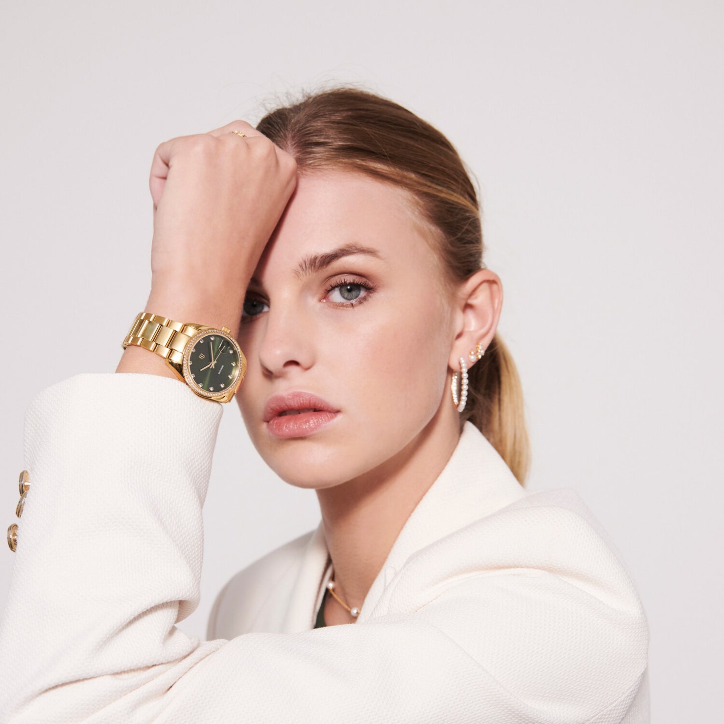 Stainless steel gold | Grön urtavla och vita zirkoner